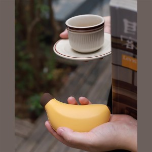 گرمکن دست و پاوربانک موبایل طرح فانتزی موز مدل HW03
