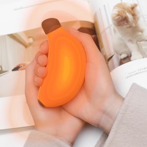 گرمکن دست و پاوربانک موبایل طرح فانتزی موز مدل HW03